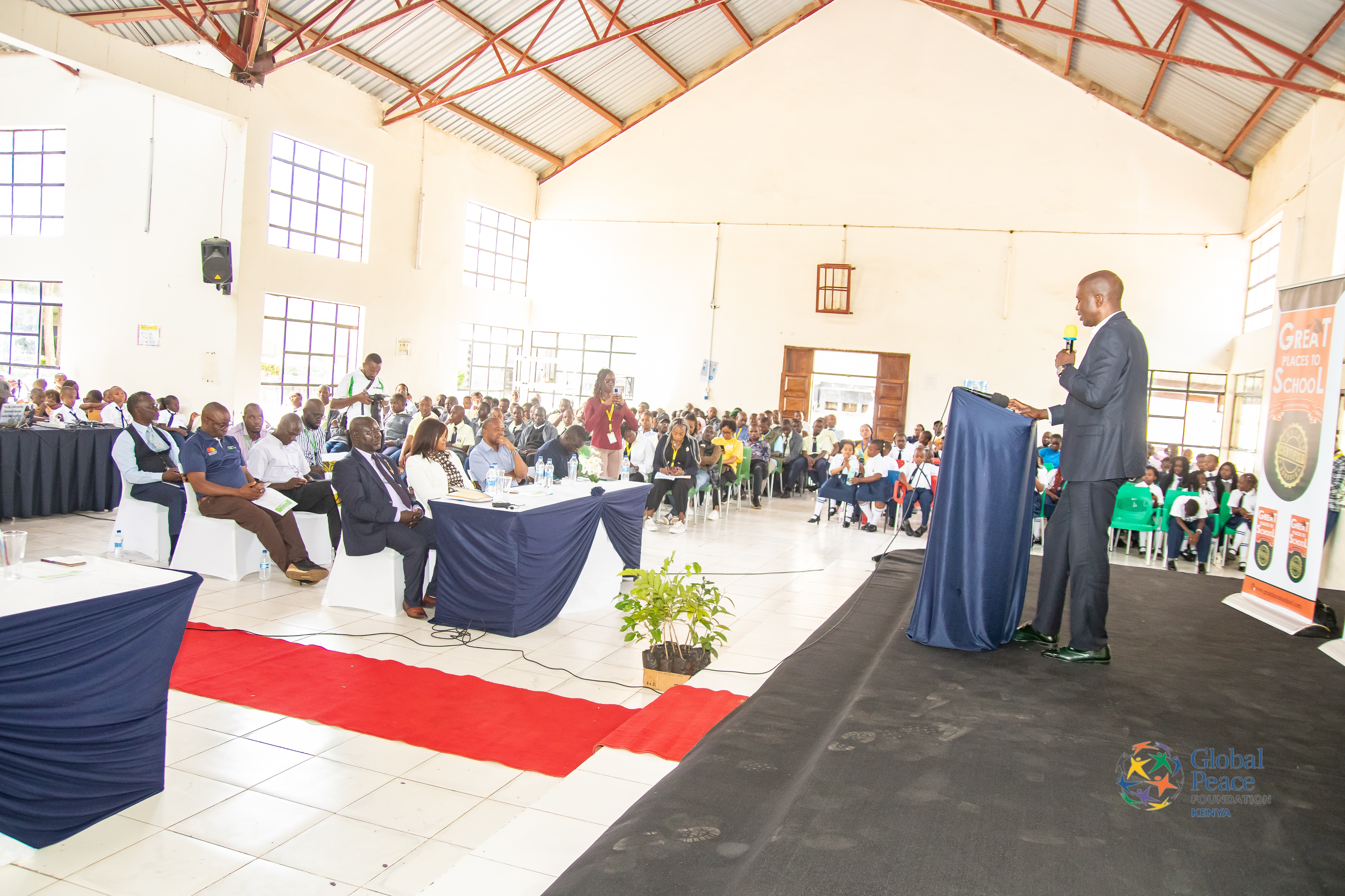 Engaged audience at a tech conference in Kenya
